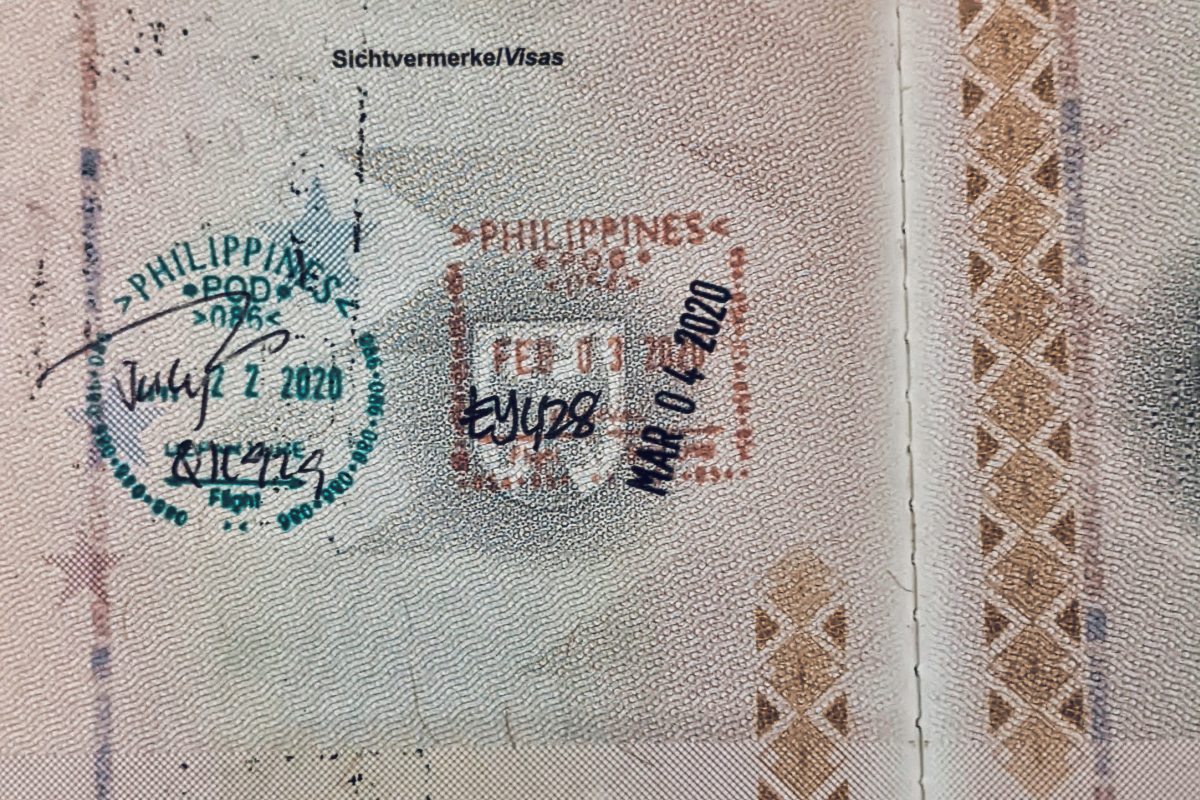 Philippines tourist visa on arrival stamps on a passport page